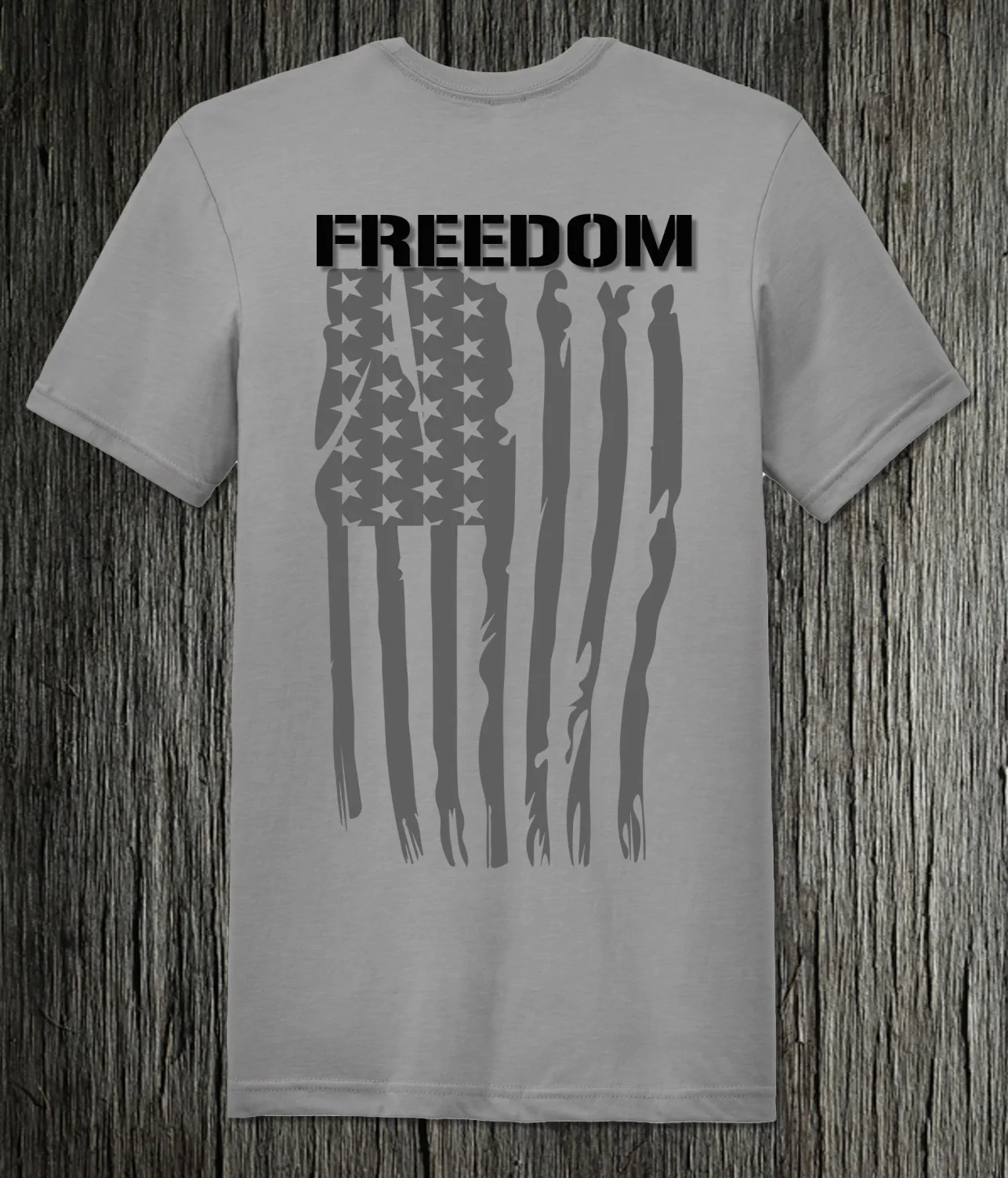 Patriot's Comfort: Ultra-Soft Cement Short Sleeve Tee with American Flag & Freedom