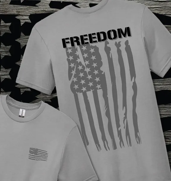 Patriot's Comfort: Ultra-Soft Cement Short Sleeve Tee with American Flag & Freedom