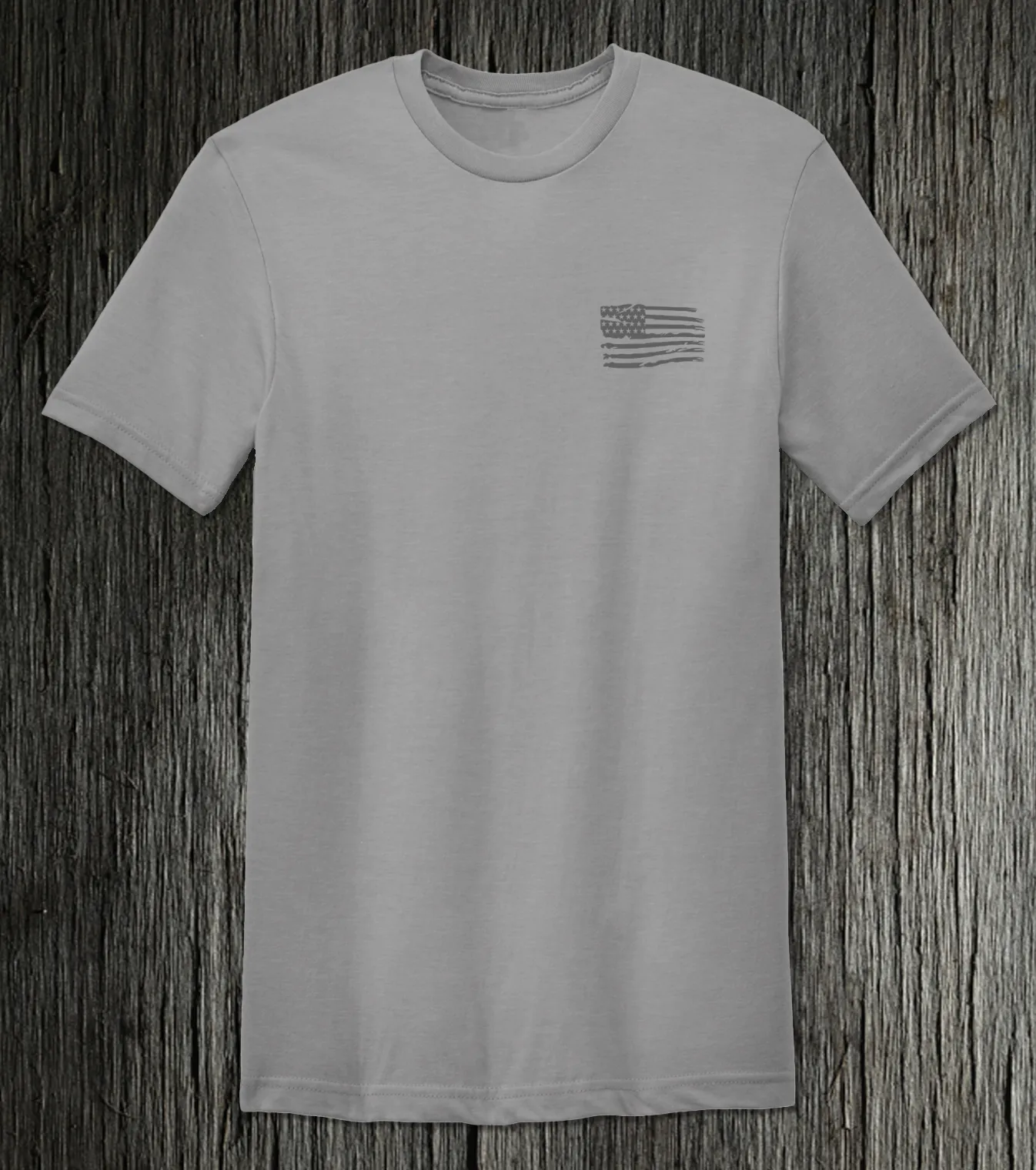 Patriot's Comfort: Ultra-Soft Cement Short Sleeve Tee with American Flag & Freedom